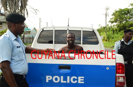 Police guard the suspected bandit