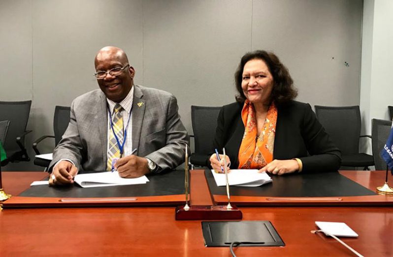 Finance Minister Winston Jordan and World Bank Country Director for the Caribbean, Tahseen Khan