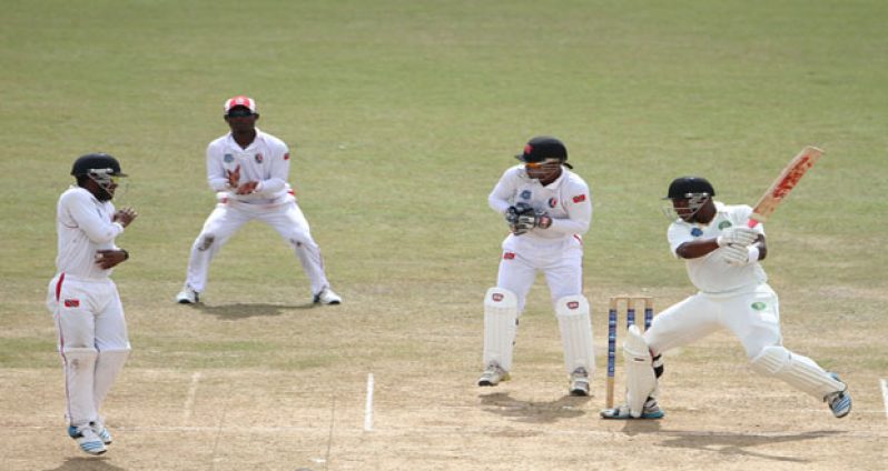 Christopher Barnwell cuts during his unbeaten 65  on the third day of the fourth round match between Trinidad & Tobago Red Force and Guyana Jaguars in the WICB Professional Cricket League Regional 4-Day Tournament at Queen’s Park Oval.
 Photo by WICB Media/Ashley Allen