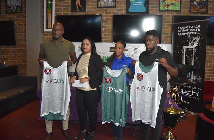 Organiser Rawle Toney (first from left), along with Allegiance Corporations Inc. Director Rhonda Roberts (second from left) and JD Carn ICT Guyana Inc. representative, Ocey Phillips (first from right).

 