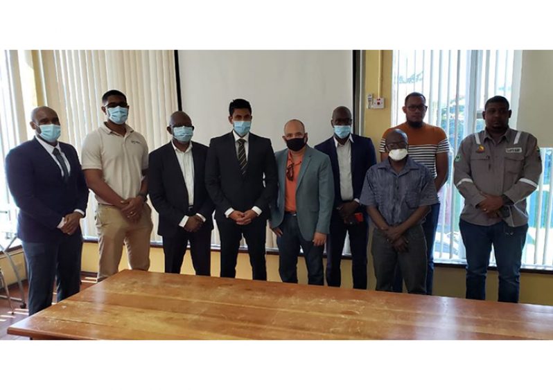 Minister of Sport Charles Ramson Jr (fourth from left) along with executives of GABF and GABA, following their meeting at the National Racquet Centre