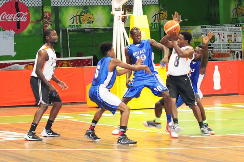 Part of the action between the Victory Valley Royals (Blue) and the Ravens (Delano Williams Photo)