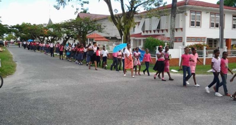 Walking along Peter Rose Street, from the Josel Educational Institue to the Seventh-Day Adventist Church Headquarters