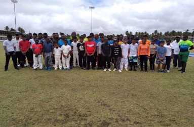 Fast bowlers pose with Sir Andy Roberts and Roland Butcher after Friday’s session.