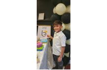 Little Christopher Joseph Barran at the launch of his business