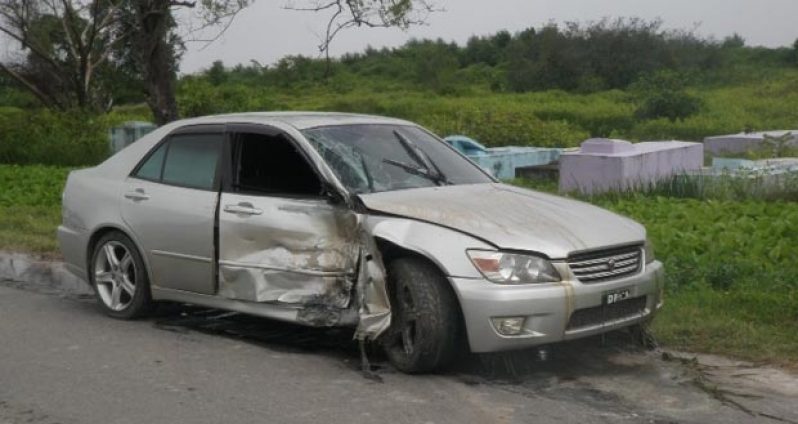 The damaged car after the collision with the CBR motorcycle