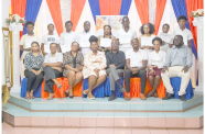 BIT’s CEO, Richard Maughn (seated centre), flanked by some of the graduates who received their certificates during a graduation ceremony at the Regency Hotel in Georgetown on Friday