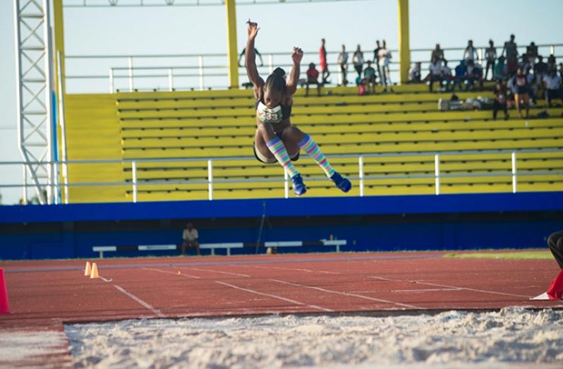 Chantoba Bright enroute to her Female’s Long Jump Gold Medal. (Delano Williams Photo)