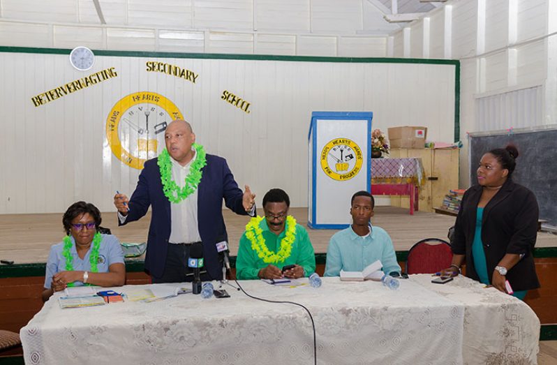 Minister of Natural Resources, Raphael Trotman addresses residents in the presence of other Ministers of Government and Neighbourhood Democratic Council (NDC) members (Delano Williams photo)
