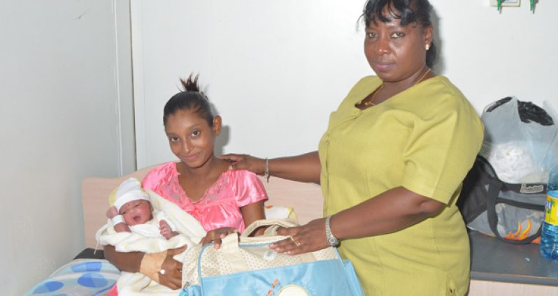 Minutes after the first baby came into the world, Heimrajie Ramdat was overwhelmed with joy after delivering her son at 12:55h. The 23-year-old mother resides at Lot 95 Hope Estate, East Coast Demerara. She also received a token from the GPHC.