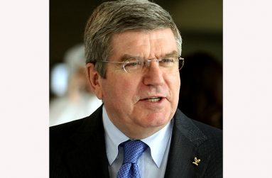 IOC President Thomas Bach will arrive 11 days ahead of the planned opening ceremony.