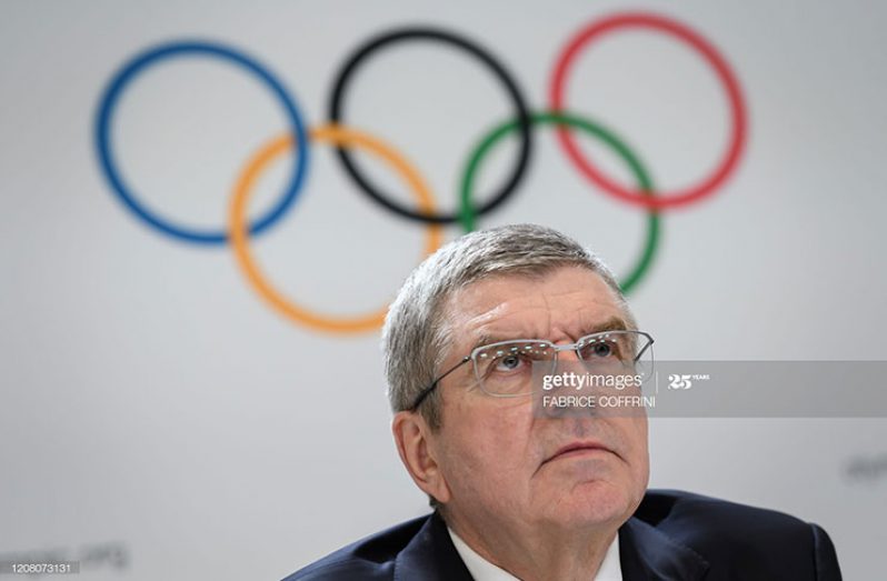 IOC president Thomas Bach at a press conference in Lausanne on March 23, 2020 called for the Tokyo Olympics to be postponed over the coronavirus pandemic, as Canada pulled out of the Games and Japan's prime minister admitted a delay could be "inevitable". (Photo by Fabrice Coffrini/AFP via Getty Images)