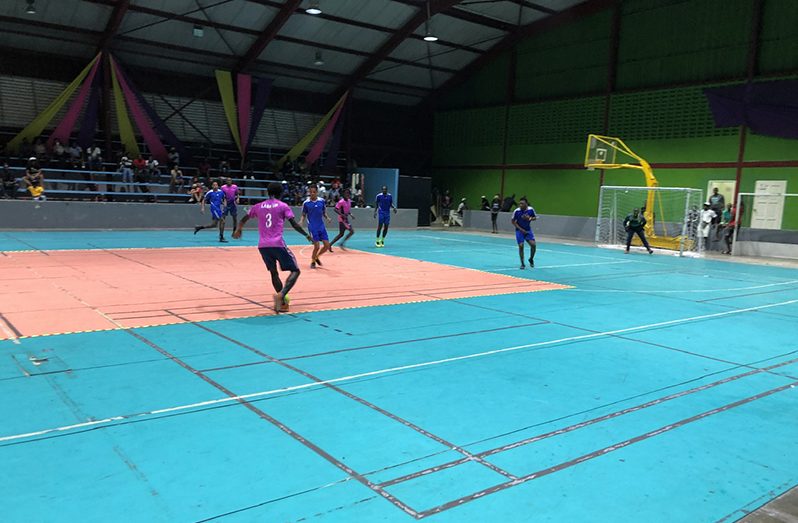 Action in the quarter-final round between Back Circle (pink) and North Ruimveldt