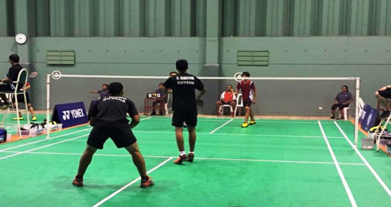 Action in the Boys Doubles between Guyanese Narayan Ramdhani and Jonathan Mangra and Mariano Novoa and Gustavo Alfredo Salazar.