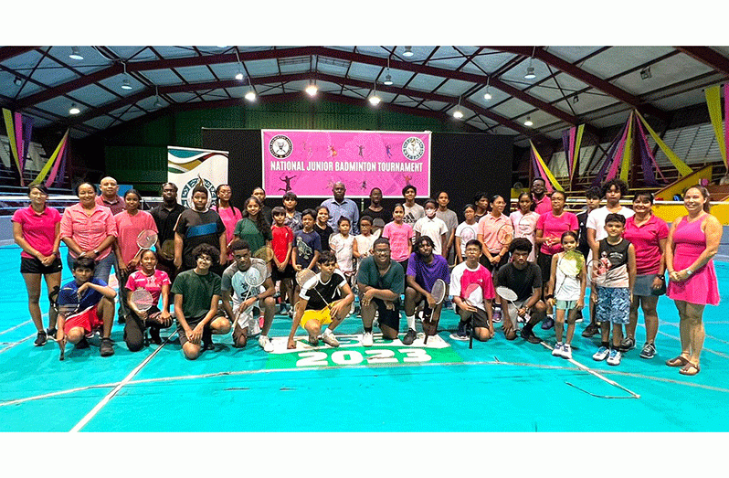 Director of Sport Steve Ninvalle (Standing middle back row) with the players and GBA officials at the opening of the Nat Jnr Badminton tourney