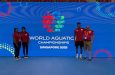 Guyana Amateur Swimming Association President Yolema Phillips and Sean Baksh with the Olympic duo