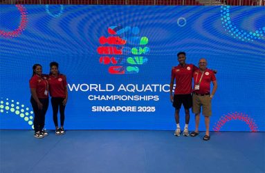 Guyana Amateur Swimming Association President Yolema Phillips and Sean Baksh with the Olympic duo