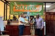 Bakewell Assistant General Manager, Mr. Shannan Ganga, hands over sponsorship cheque to Mr. Kashif Muhammad with Aubrey ‘Shanghai’ Maor, at right