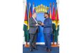 FIFA VP and CONCACAF President, Victor Montagliani, presents a ball to Guyana’s Head of State, President Dr. Irfaan Ali