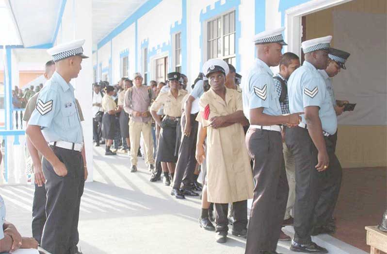 Flashback: Members of the Guyana Police Force line up to vote on February 21, 2020, ahead of the General and Regional Elections that were held on March 2, 2020
