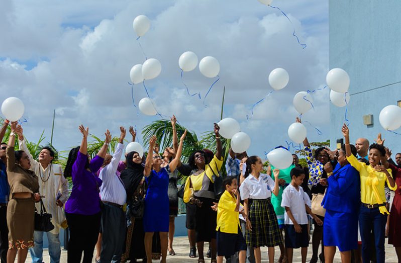 A symbolic release of white balloons in observance of International Day of Families (Delano Williams Photos)