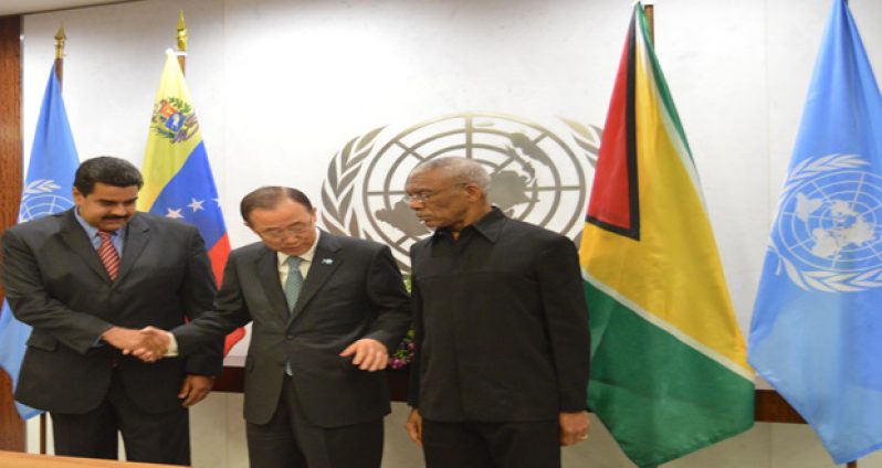 The moment when Mr Ban reached out to join hands with Presidents Granger and Maduro.