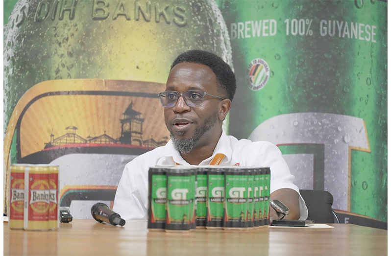 Matthew Kendall, Brew Master at Banks DIH Limited, giving remarks at the launch of the company’s new canned Banks Beer and GT Beer on Thursday (Sachin Persaud photos)