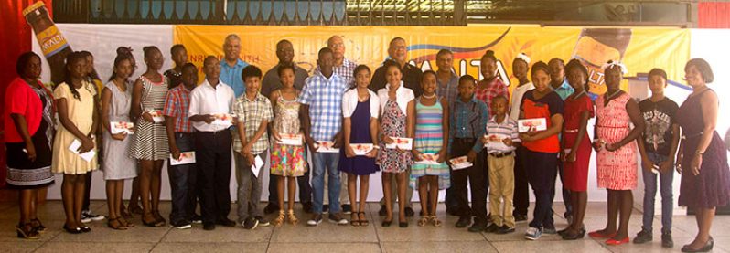 George McDonald, Co-Managing Director and senior Company Executives with the new bursary awardees.