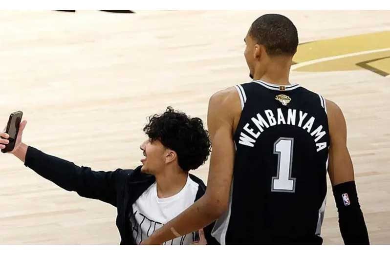 The court invader will be banned from all NBA arenas for life