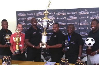 Banks DIH’s Guinness Brand Manager Lee Baptiste (3rd left) presents Petra Organisation’s Troy Mendonca with the championship trophy for this year’s Georgetown leg of the ‘Greatest of the Streets’ tournament. From left are Wayne Griffith, Brian Choo, Troy Peters and Mortimer Stewart.