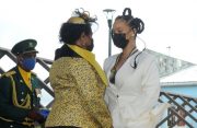 National Hero, The Right Excellent Robyn “Rihanna” Fenty receives her insignia from President of Barbados, Dame Sandra Mason at the National Independence Awards Ceremony Wednesday (B. Hinds/BGIS)
