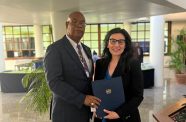 The Minister of Public Works, Bishop Juan Edghill, along with another official at the recently concluded four-day high-level Global Supply Chain Forum in Barbados