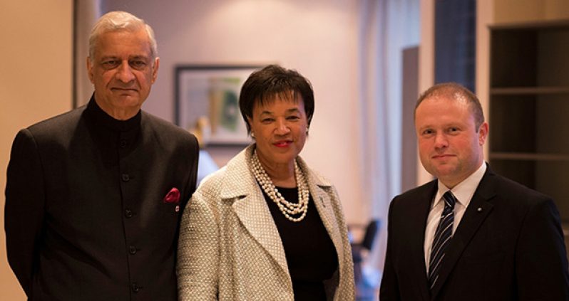 Baroness Patricia Scotland poses with outgoing Commonwealth Secretary-General Kamalesh Sharma, left, and Prime Minister of Malta Joseph Muscat, just after she was selected as the new Secretary General of the Commonwealth. (Commonwealth Secretariat photo)