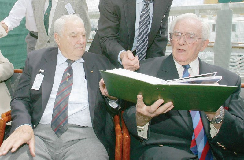 Barry Jarman (left) with former teammate Alan Davidson in 2010. (GettyImages)