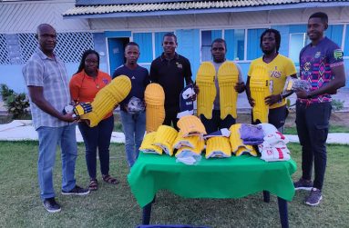 Barbados Royals’ physiotherapist Neil Barry Jr. (far right) along with representatives from the clubs and President of the Georgetown Cricket Association, Neil Barry Snr. (far left)