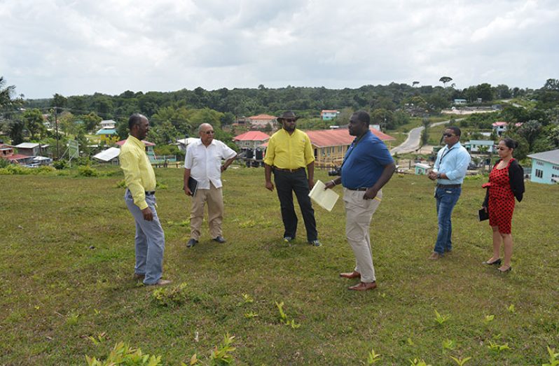 The Community Radio Project team along with regional officials assessing the compound of the resource centre to determine the best location for the dish