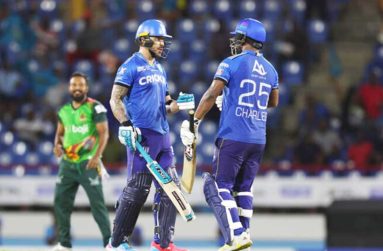 Faf du Plessis (left) and Johnson Charles of St. Lucia Kings bring up their 50 partnership during the Men's 2024 Republic Bank Caribbean Premier League match between St Lucia Kings and St Kitts and Nevis Patriots on Thursday night. CPL T20/CPL T20 via Getty Images.