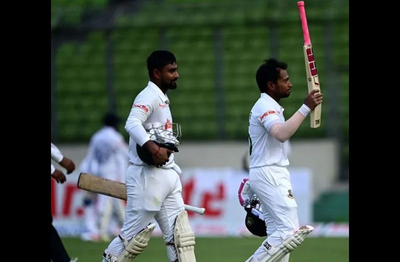 Mushfiqur and Litton walk back undefeated after their double-century stand  •  AFP/Getty Images