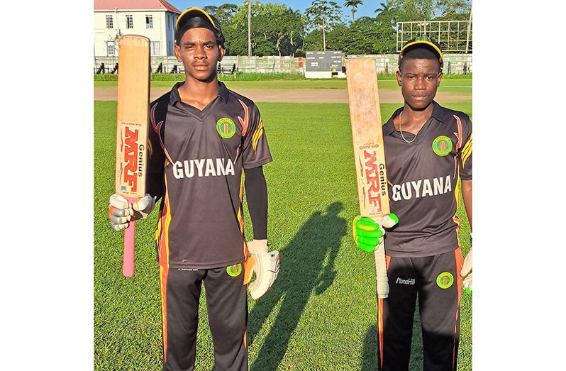 Adrian Hetmyer (left) and Player of the Match Emmanuel Lewis spearheaded Guyana to victory