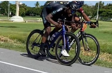 Briton John (left) and Christopher Griffith battle on the finish line.