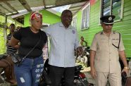 Minister of Home Affairs, Robeson Benn and Regional Commander, Assistant Commissioner Khali Pareshram and other senior law enforcement officials met with grieving relatives and friends of the victims