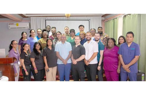 Minister of Health Dr. Frank Anthony (centre) flanked by healthcare workers that participated in the Basic Emergency Medicine Skills and Preparedness Training programme in Berbice