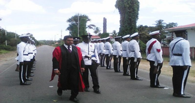 Justice Navindra Singh inspects the guard of honour at the opening of the October session of the Berbice Assizes.
