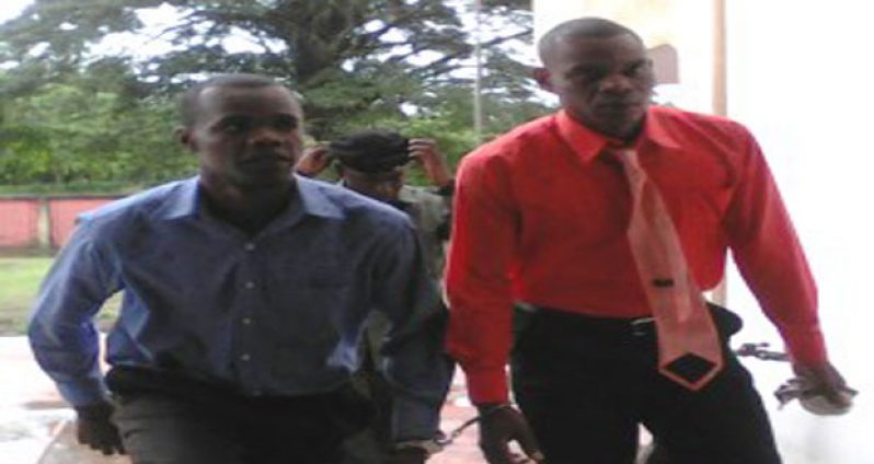 Murder accused Marlon Fordyce and Troy Stewart as they entered the Berbice High Court last Tuesday