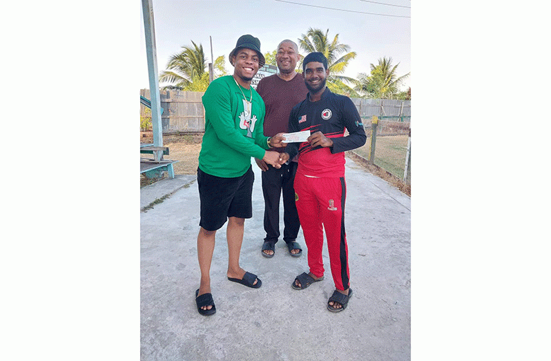 Berbice Under-17 Captain receives the sponsorship from Shimron Hetmyer in the presence of BCB president, Hilbert Foster