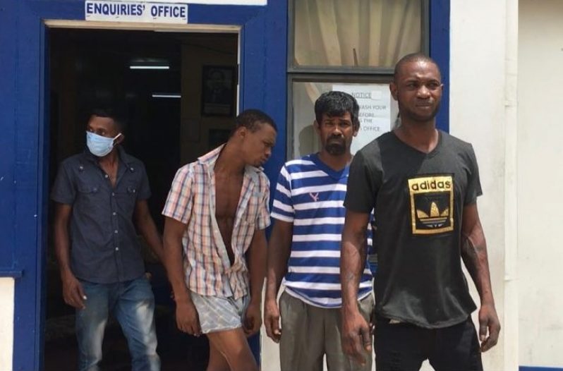 These four men are among several others who were charged for breaking the curfew in Berbice.