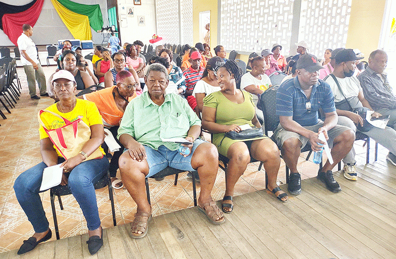 Persons waiting their turn at the Berbice High School auditorium to see visiting medical personnel