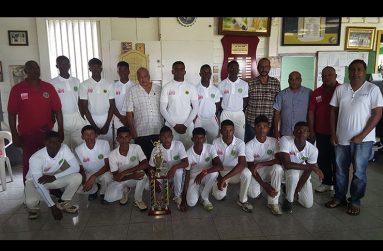 The victorious Berbice team poses with acting executives of the BCB after the presentation ceremony.