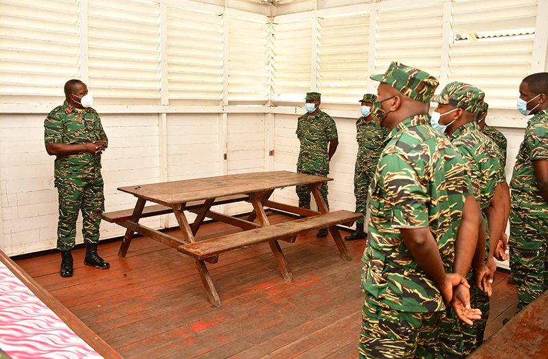 Chief-of-Staff (ag), Brigadier Godfrey Bess (extreme) left engages soldiers during his routine Berbice visit (GDF photo)