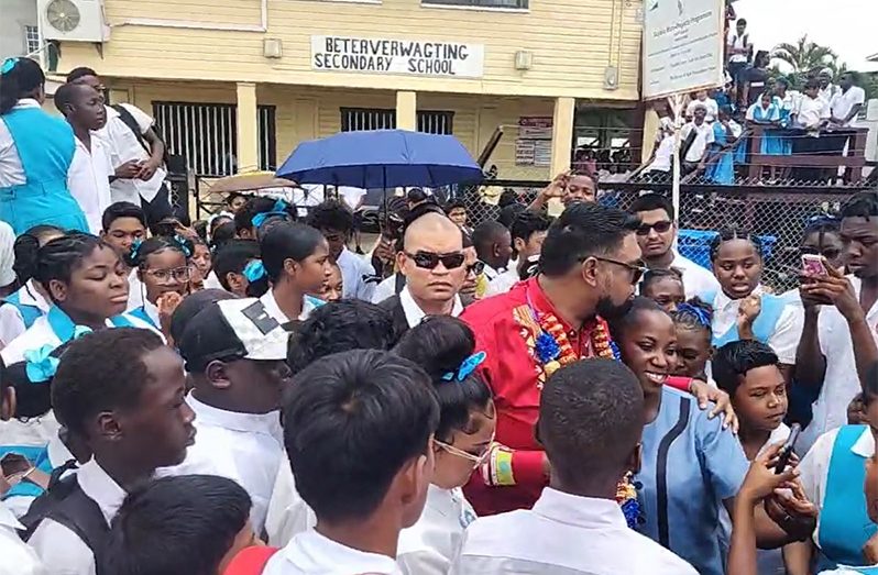 Beterverwagting
Caption: President Dr. Irfaan Ali with students and teachers of Beterverwagting Secondary School on Wednesday